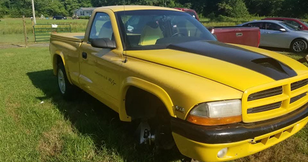 1999 Dodge Dakota R/T in solar yellow.